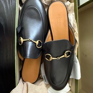 Gucci Black Leather Mules with Gold Hardware